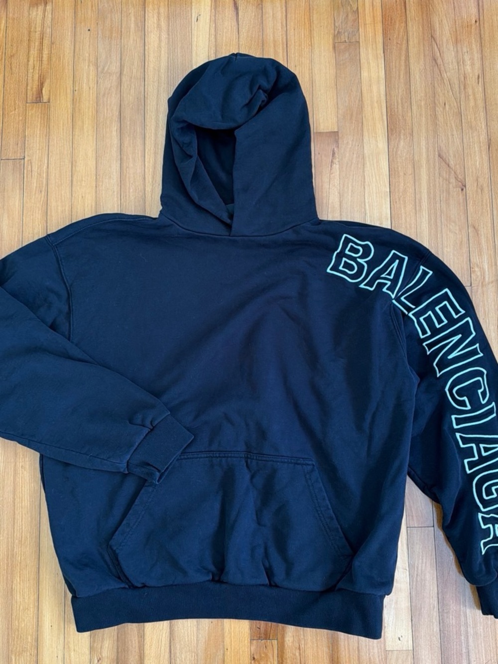 Balenciaga Black Hoodie with Contrasting Sleeve Logo
